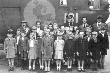 Children from West Lynn School visiting Wendling air base. (Image MC371/912, Norfolk Record Office.)