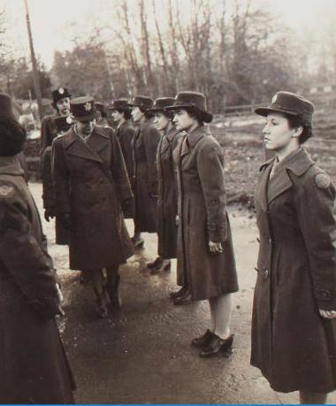 Col Oveta Culp Hobby inspecting WACs at Ketteringham Hall on 14 January 1944. (Digital archive reference MC 376/251)